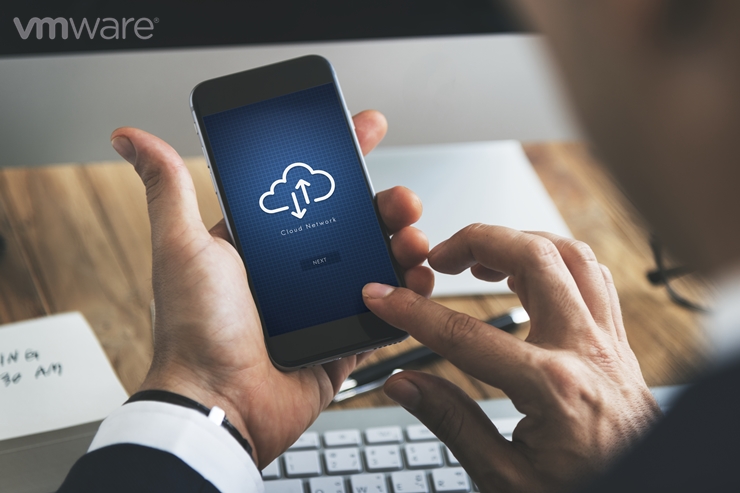 Closeup of businessman's smartphone with cloud computing symbol